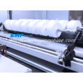 Nonwoven fabric slitting and rewinding machine